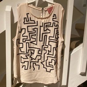 i Madeline Sleeveless zip up blouse with sparkly sequin design on front.